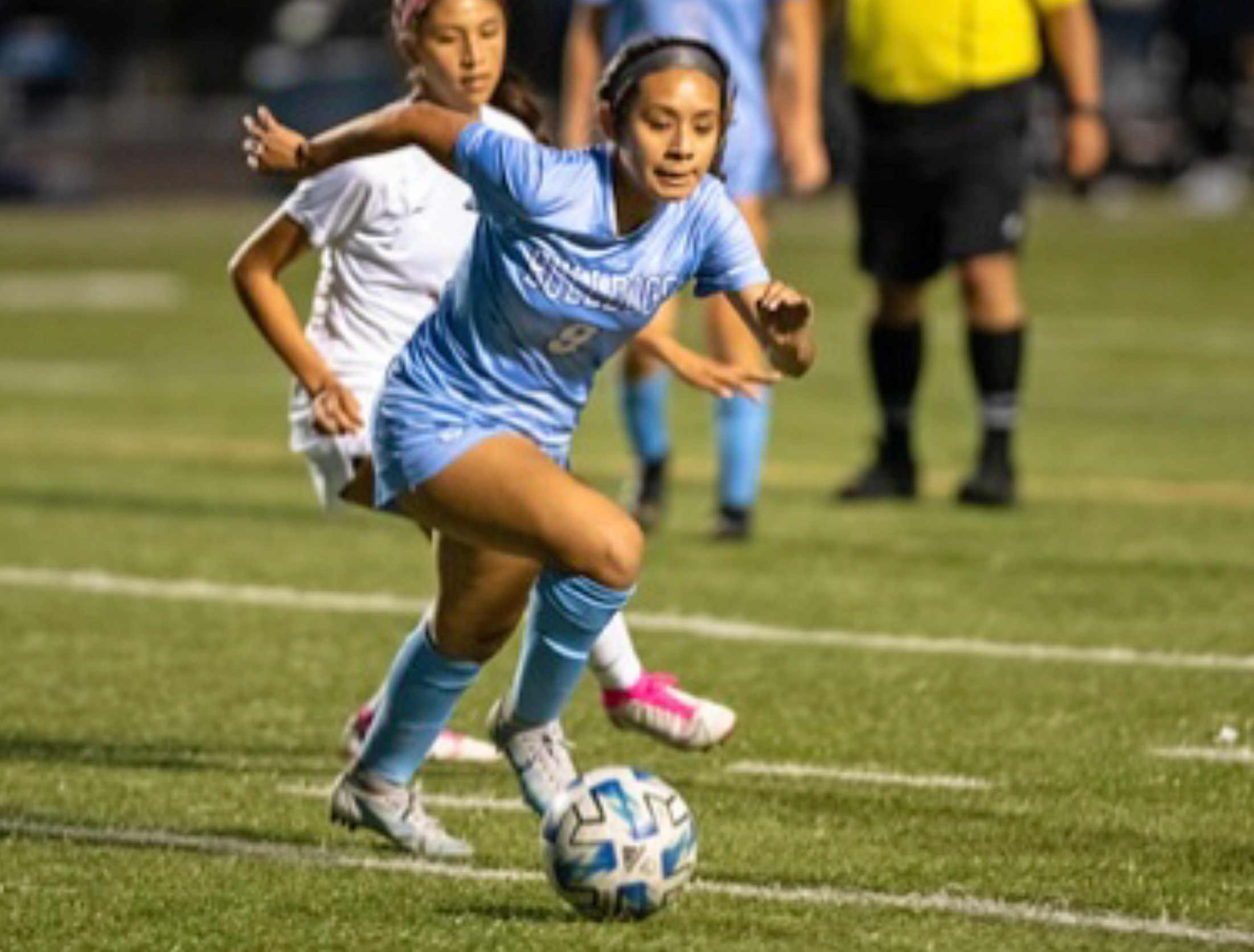 esmerelda hernandez chases a loose ball during a high school game